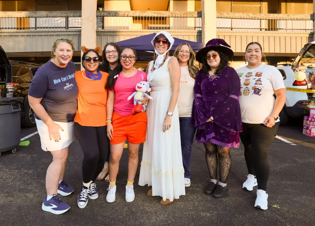 Carlson Law Firm staff dressed for Halloween at the Temple Trunk or Treat celebration